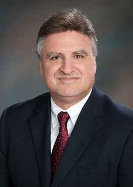George Smith, M.D., headshot for Community Care Board