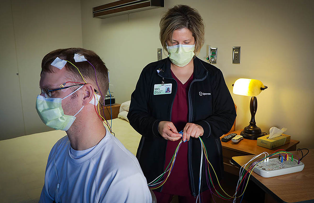 Patient getting set in Sleep Center by Pulmonary Care specialist
