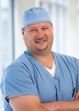 Mark Weismiller, MD in scrubs