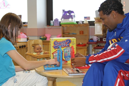 Globetrotters star plays with young patients